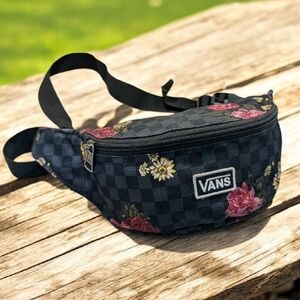 Vans Traveler fanny pack in a black checkerboard pattern with a floral print